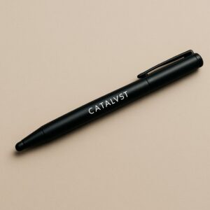 Matte black metal stylus pen with sleek design on neutral background, ideal for corporate giveaways